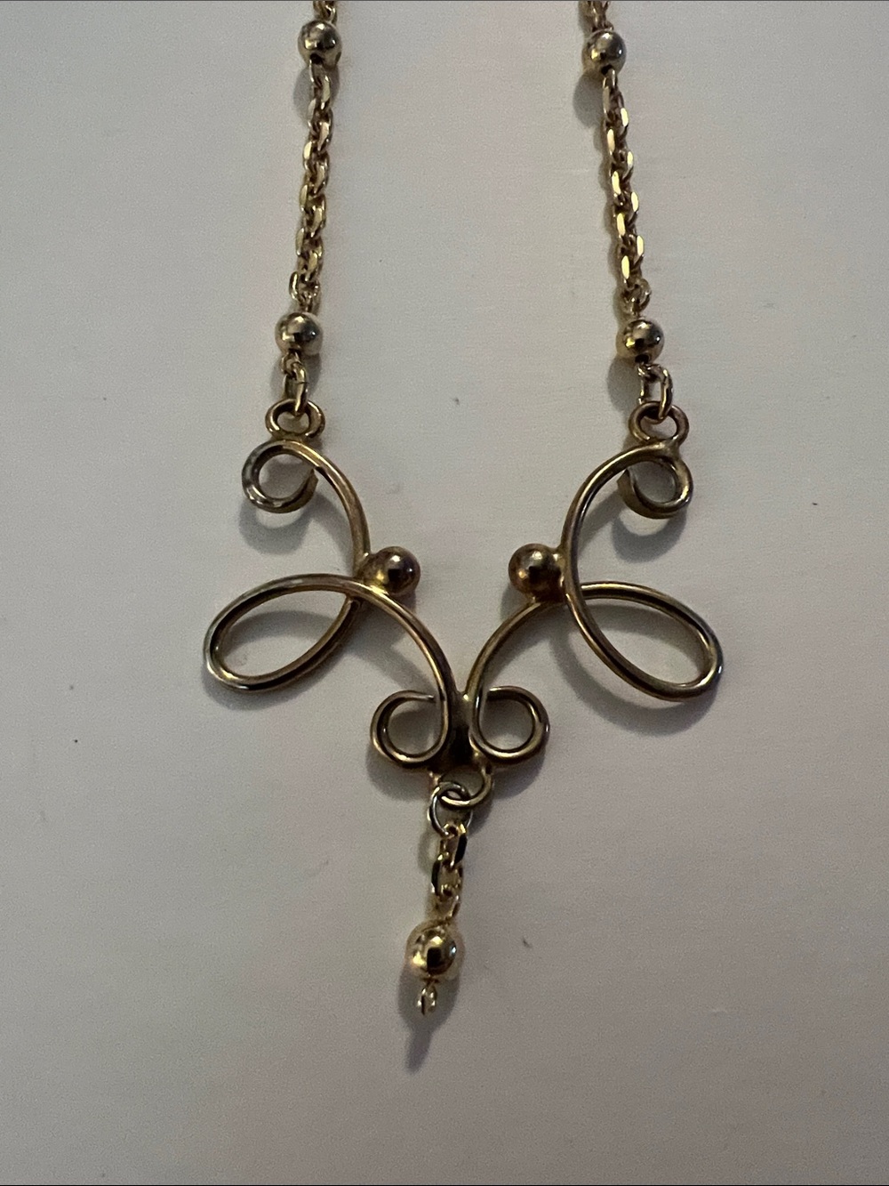 Elegant Gold-Tone Swirl Pendant Necklace - Women Jewelry